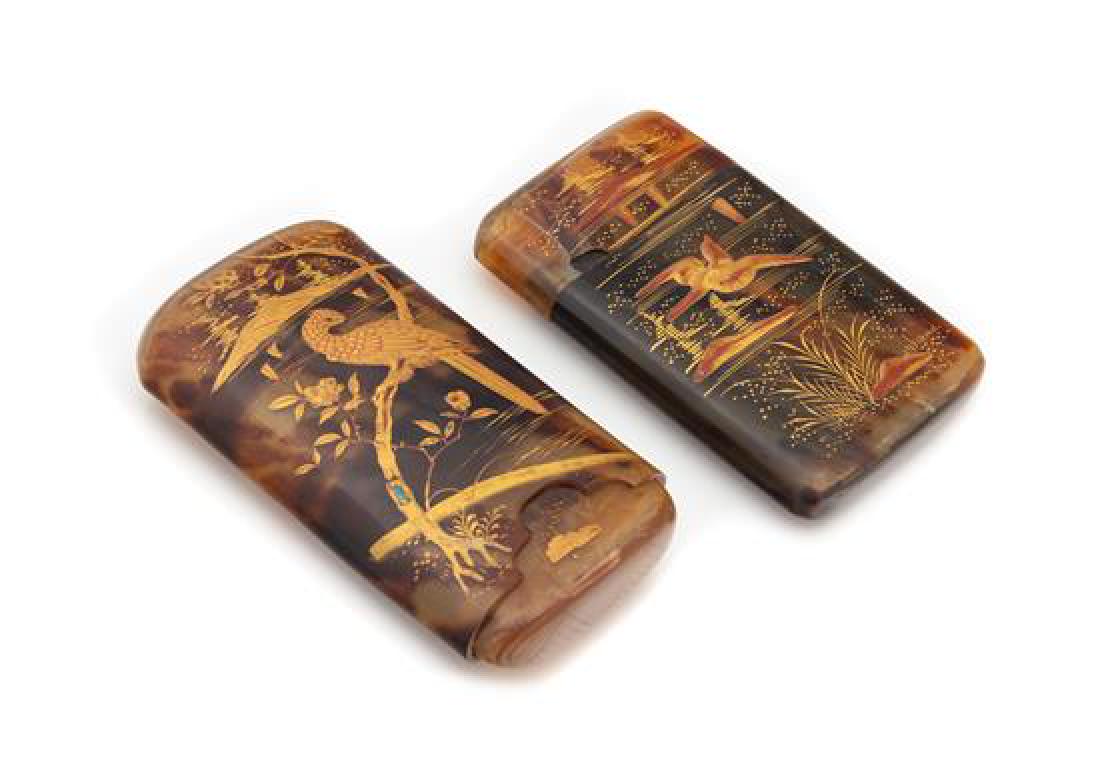 * Two Japanese Lacquered Tortoise Shell Cases Width of: * Two Japanese Lacquered Tortoise Shell Cases early 20th century comprising a mother-of-pearl inset card case and a spectacles case. Width of larger 5 3/8 inches. Estimate $400-600 Property from the C
