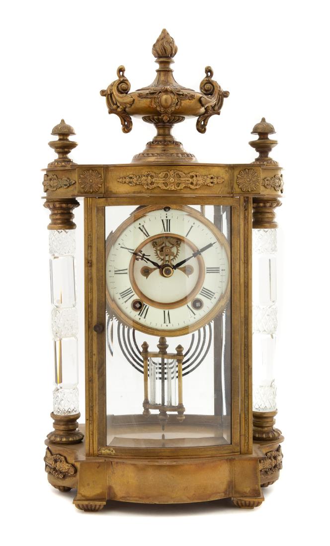* A French Gilt Bronze and Cut Glass Regulator Clock