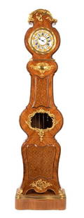 An Louis XV Style Gilt Bronze Mounted and Parquetry: An Louis XV Style Gilt Bronze Mounted and Parquetry Tall Case Clock after charles cressent, late 19th century clock face signed Balthazar, Paris. Height 98 x width 26 x depth 12 inches. Estimate $3,00