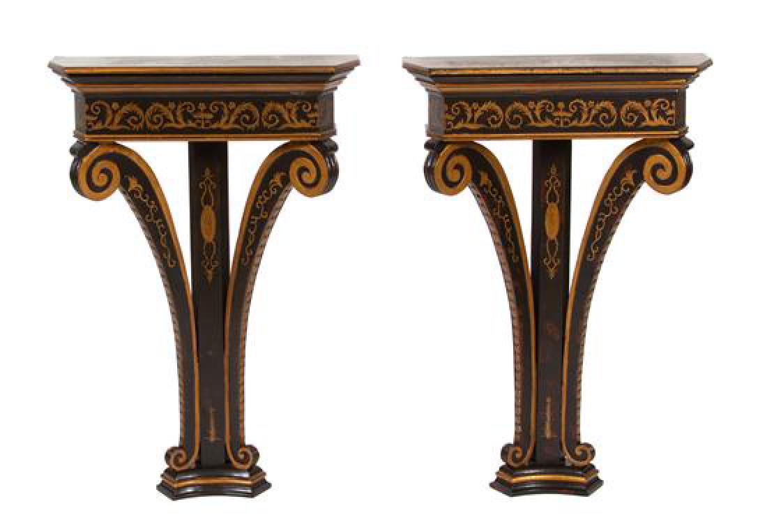 A Pair of Regency Style Black and Gilt Decorated: A Pair of Regency Style Black and Gilt Decorated Demilune Wall Mounted Console Tables 20th century Height 34 3/4 x width 23 x depth 8 inches. Estimate $300-500