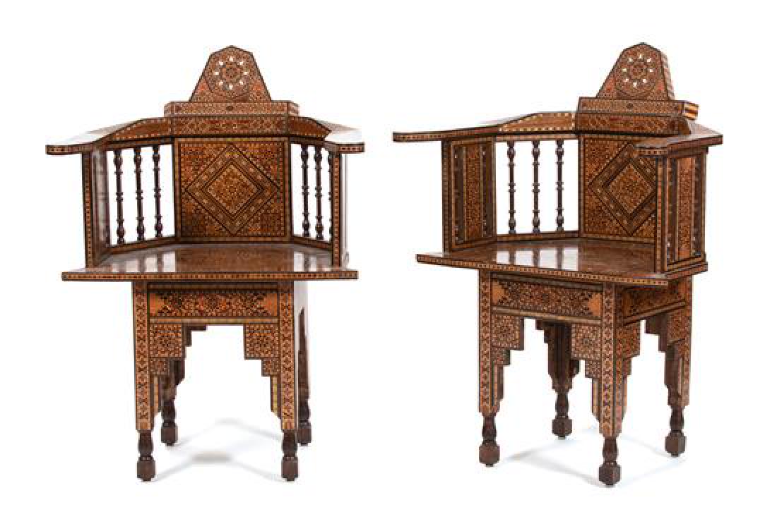 A Pair of Syrian Parquetry Mother-of-Pearl Inlaid Open: A Pair of Syrian Parquetry Mother-of-Pearl Inlaid Open Armchairs 20th century Height 36 x width 25 3/4 inches. Estimate $800-1,200