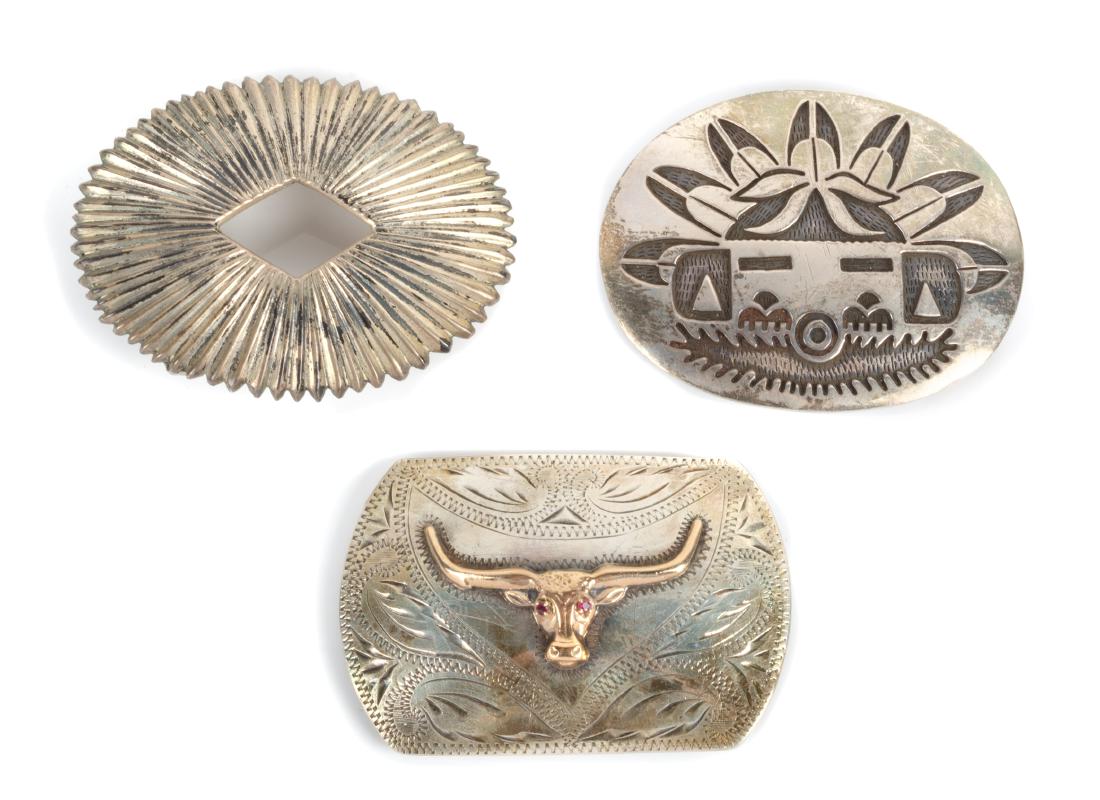 Manuel Hoyungwa Height 2 3/8 x 3 inches: Manuel Hoyungwa Height 2 3/8 x 3 inches (Hopi, 1953-2011) silver belt buckle depicting a Kachina, together with two other southwestern style buckles