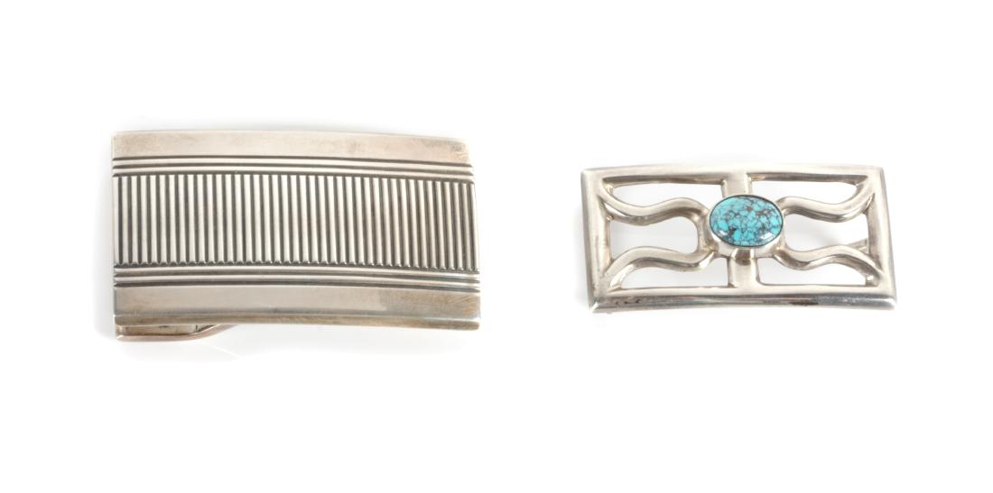 Sam Roanhorse Height of first 1 3/8 x 2 3/8 inches: Sam Roanhorse Height of first 1 3/8 x 2 3/8 inches (Navajo, 1915-1983) silver belt buckle, stamped SR Handmade Sterling, together with a silver and turquoise buckle