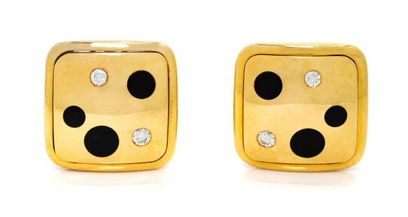 A Pair of 18 Karat Yellow Gold, Diamond and Onyx: A Pair of 18 Karat Yellow Gold, Diamond and Onyx Earclips, Michael Bondanza, containing four round brilliant cut diamonds weighing approximately 0.32 carat total and six round onyx inlaid plaques. Sta