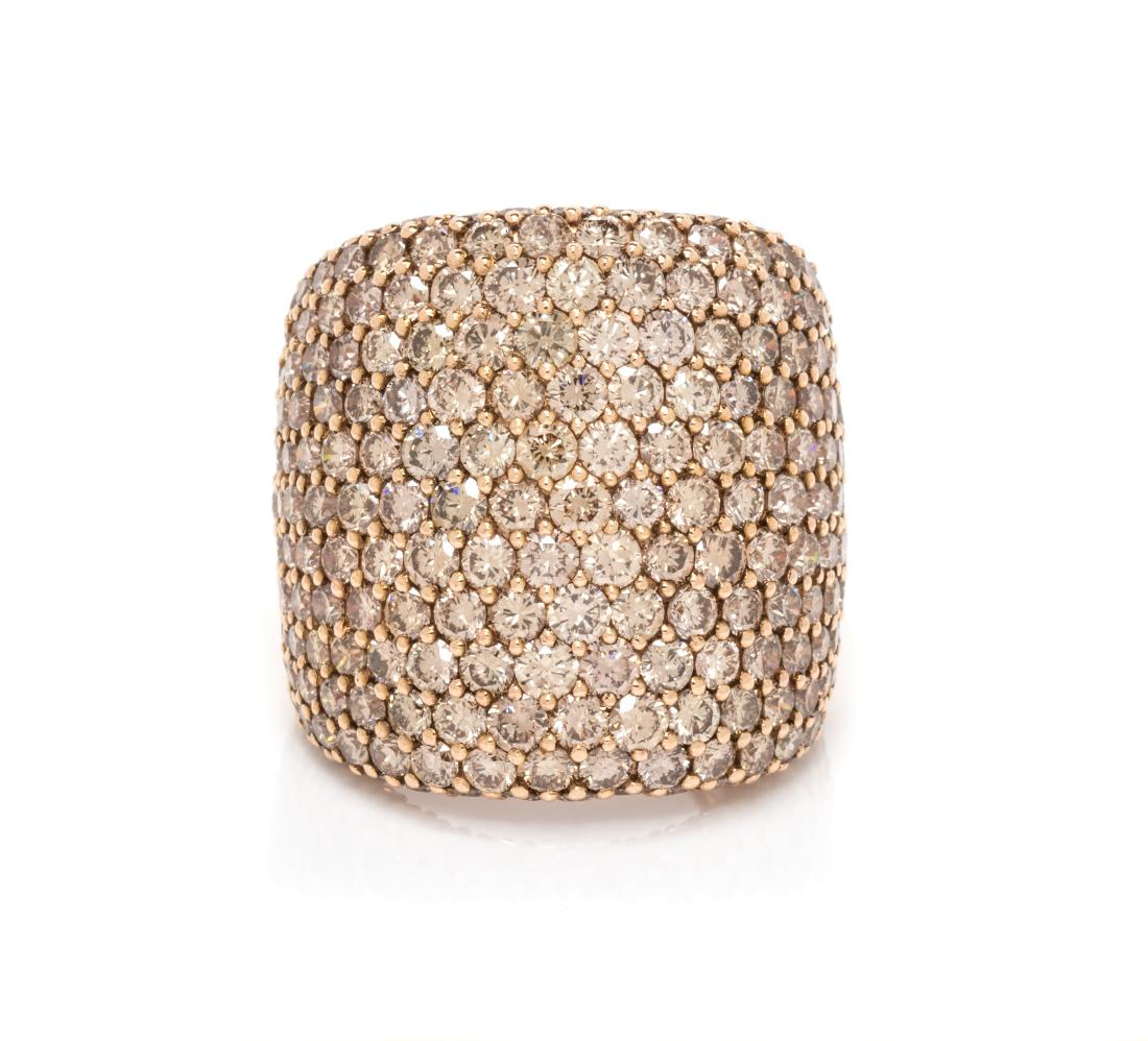 An 18 Karat Rose Gold and Colored Diamond Ring,: An 18 Karat Rose Gold and Colored Diamond Ring, Crivelli, containing numerous round brilliant cut brown diamonds (origin of color not tested) weighing approximately 10.60 carats total. Stamp: CRIVELLI