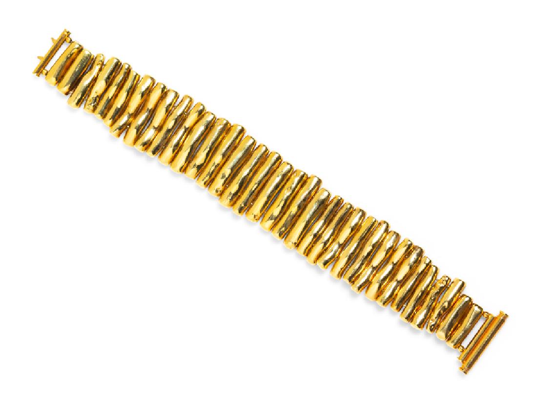 *A 14 Karat Yellow Gold Bracelet, Italian,: consisting of organic shape bar links. Stamp: ITALY 14Kt. 27.45 dwts. Property from the Collection of Scott Reed, Chicago, Illinois