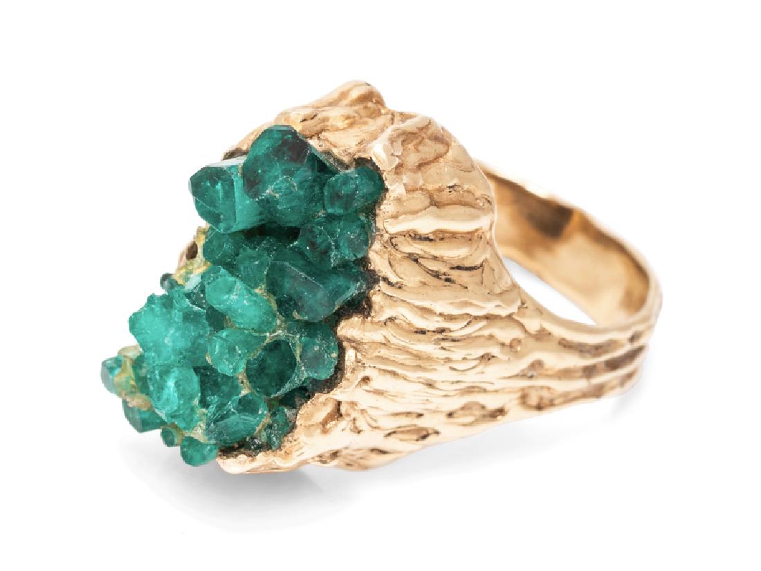 *A Yellow Gold and Synthetic Emerald Ring,: containing a synthetic emerald crystal cluster with textured gold. 7.25 dwts. Property from the Collection of Scott Reed, Chicago, Illinois