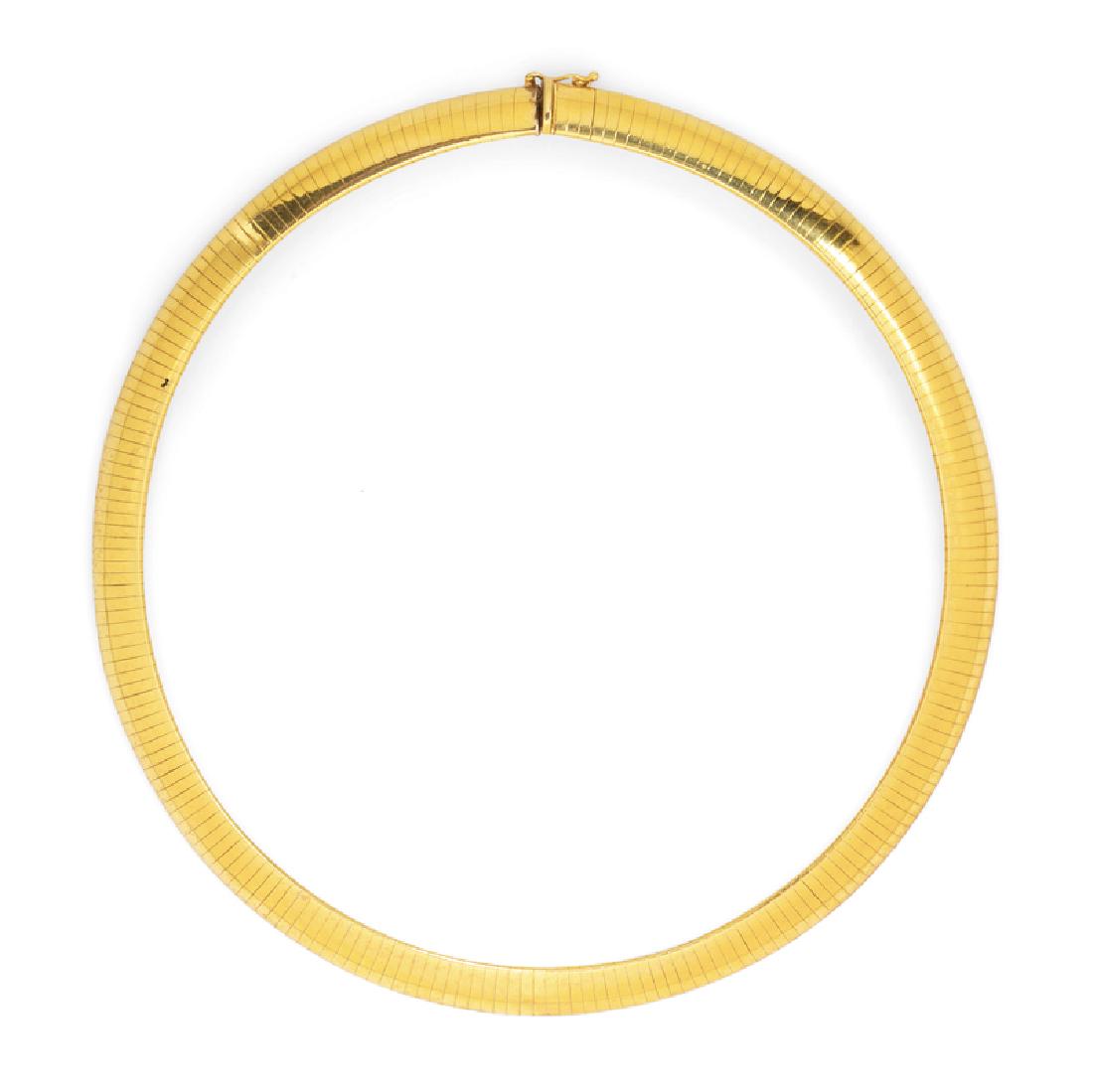 An 18 Karat Yellow Gold Necklace, Italian,: consisting of an omega chain measuring approximately 9.90 mm wide. Stamp: ITALY 18Kt FCL. 42.00 dwts. Provenance: Property from the Estate of Jacqueline Macomber, Fox Point, Wisconsin