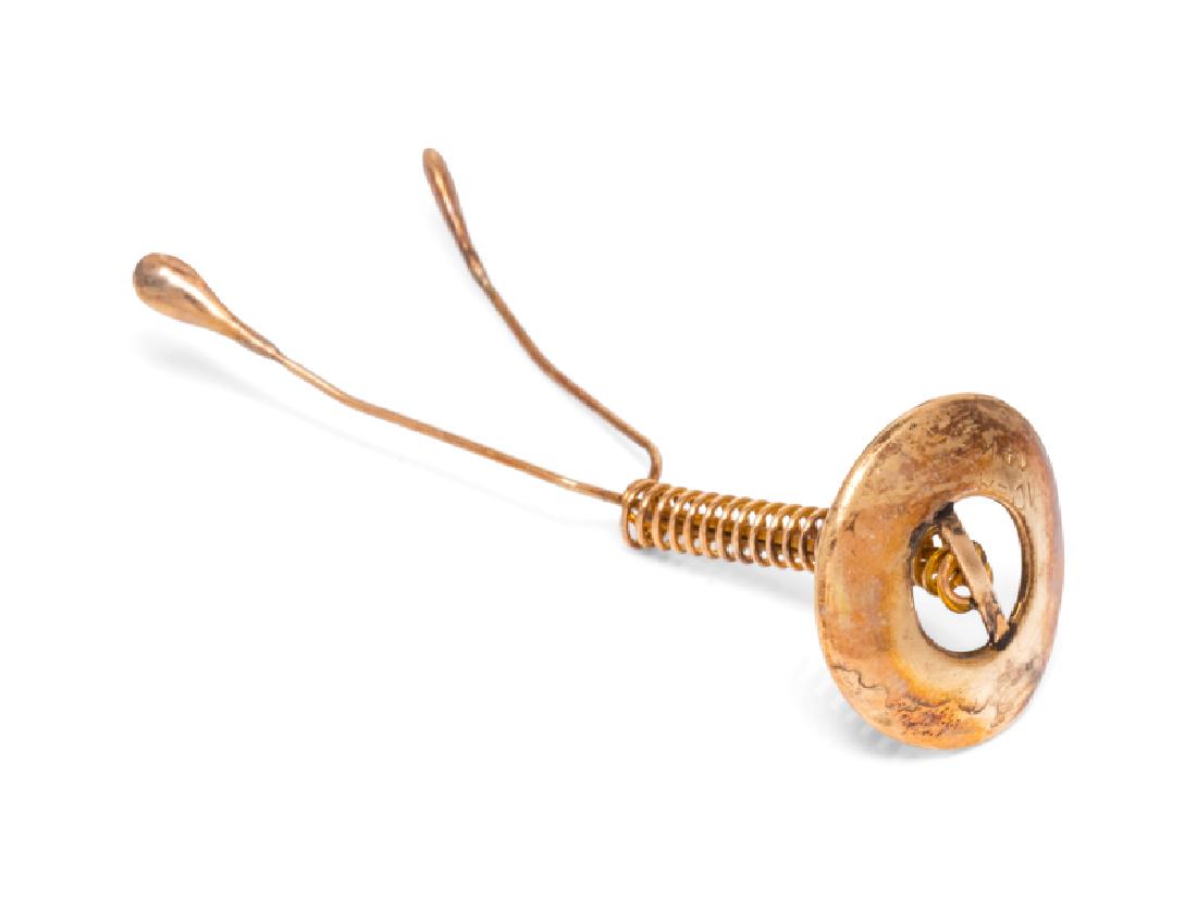 An Antique 14 Karat Yellow Gold Pessary,: measuring approximately 57.00 mm long. Stamp: IDEAL 14K. 1.80 dwts.