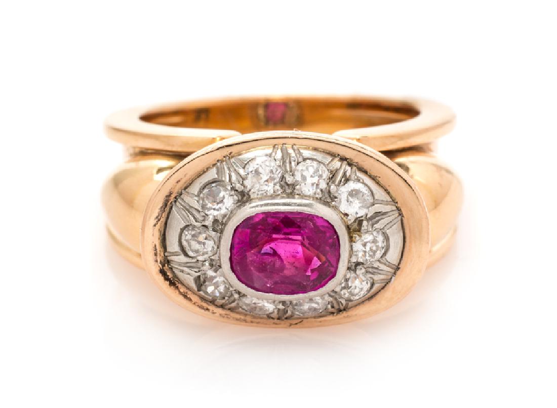 A Retro Rose Gold, Pink Sapphire and Diamond Ring,: containing one cushion shape mixed cut pink sapphire measuring approximately 6.95 x 5.60 x 3.17 mm and 10 old mine cut diamonds weighing approximately 0.04 carat total. 6.10 dwts.
