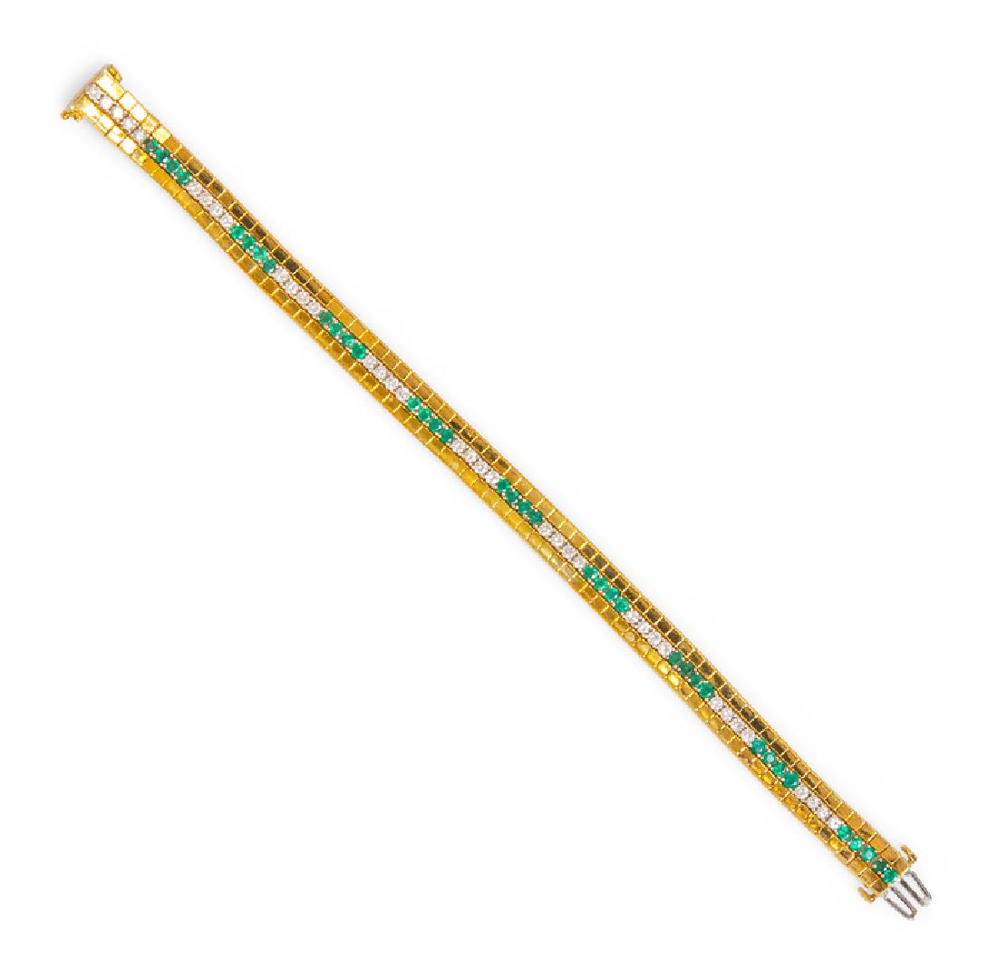 *An 18 Karat Yellow Gold, Diamond and Emerald Bracelet,: containing 37 round brilliant cut diamonds weighing approximately 1.10 carats total and 37 round mixed cut emeralds measuring approximately 2.10 mm in diameter. Stamp: H 18K. 13.80 dwts. Property from