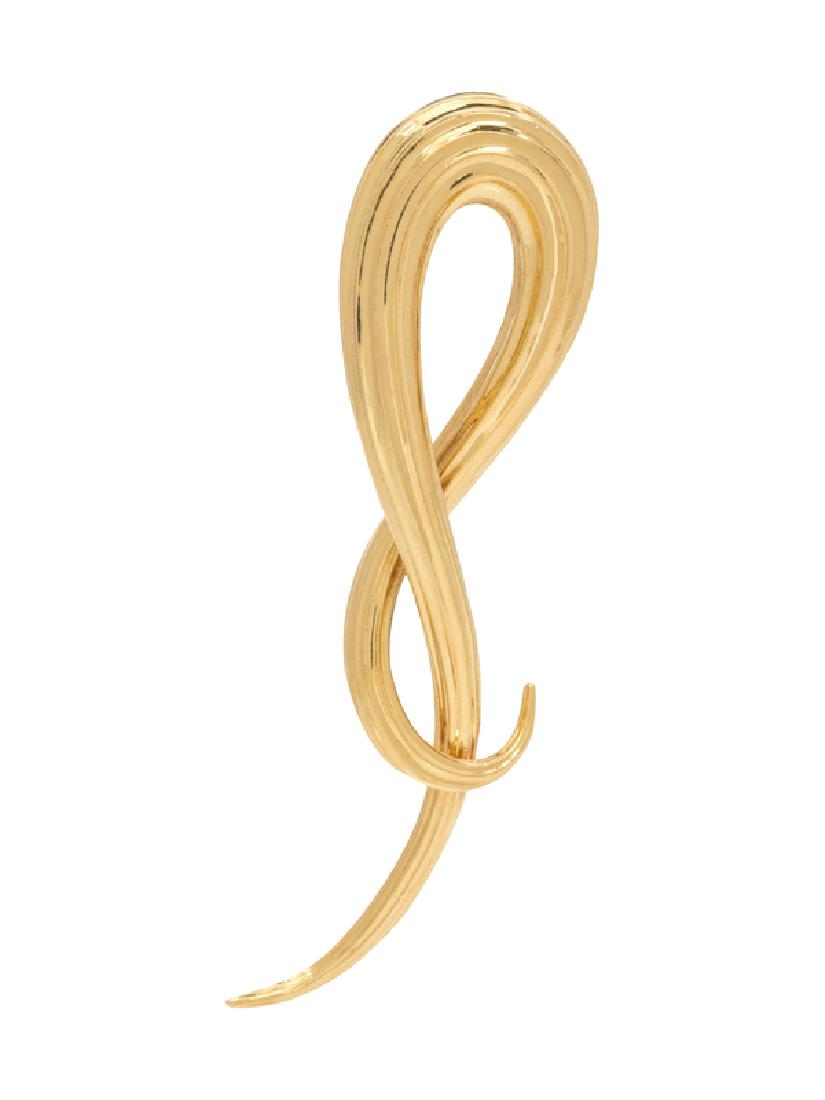 An 18 Karat Yellow Gold Brooch, Henry Dunay,: in a ribbed swirling design. Stamp: DUNAY 18K 750 (maker's mark). 16.20 dwts.