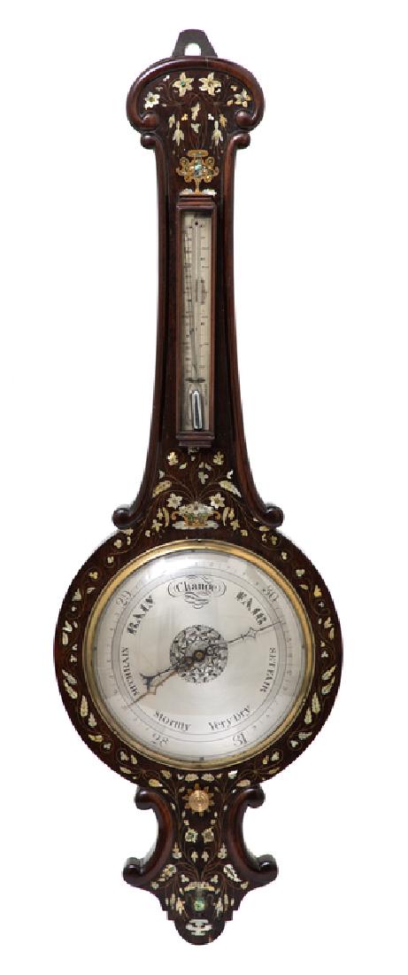 A Victorian Mother-of-Pearl Inlaid Rosewood Banjo: 19TH CENTURY Height 40 3/4 inches.