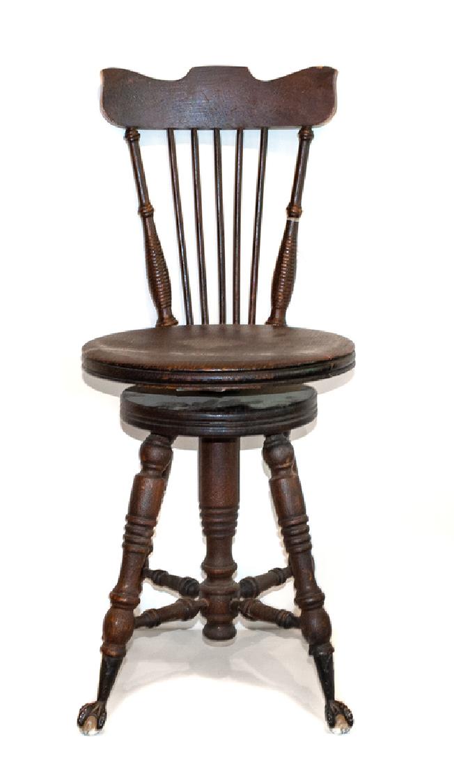 A Victorian Mahogany Piano Chair: LATE 19TH CENTURY Height 34 inches. Provenance: Property from a San Antonio, Texas Collection