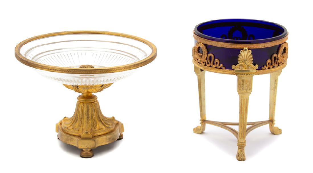 *Two French Gilt Bronze and Glass Articles: Comprising a tazza with cut glass bowl, and a cobalt glass bowl on stand. Height of taller 5 1/2 inches. Provenance: Property from the Collection of M. Anthony Greene, Atlanta, Georgia