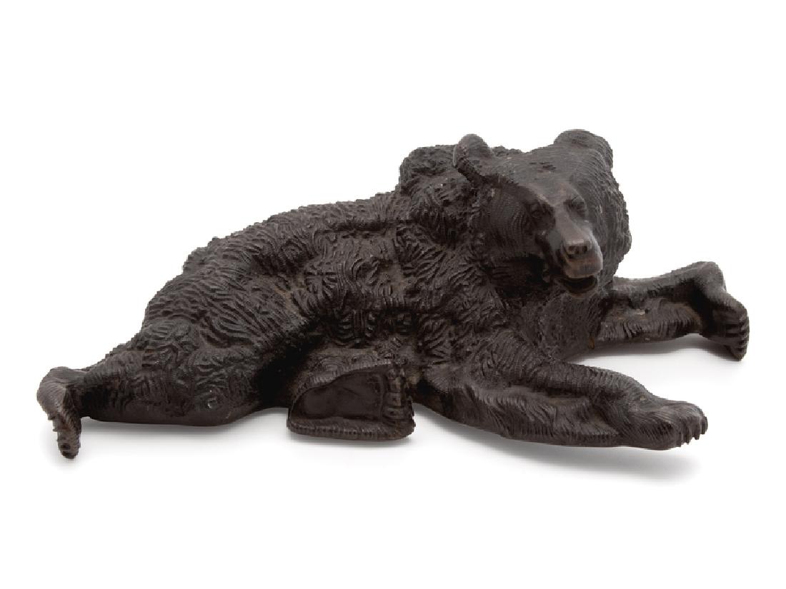 Bronze Model of a Recumbent Bear: Bronze Model of a Recumbent Bear 20TH CENTURY Height 7 1/2 x length 12 inches.