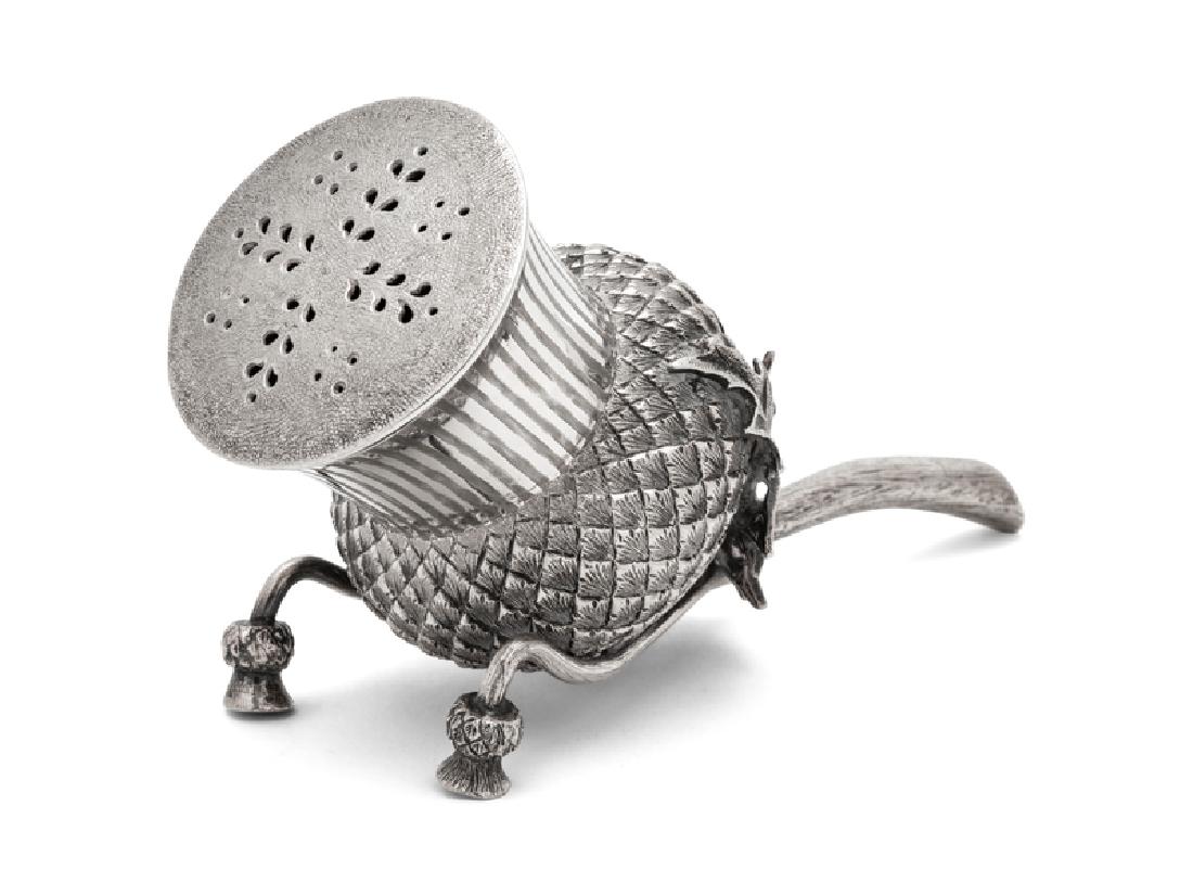 A Sheffield Plate Thistle-form Sugar Shaker: A Sheffield Plate Thistle-form Sugar Shaker FIRST QUARTER 20TH CENTURY by William Needham. Height 3 3/4 inches.