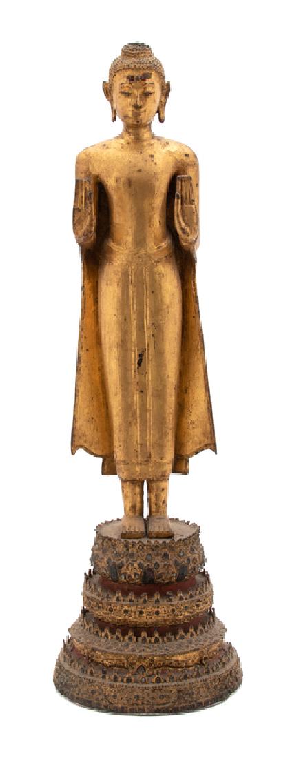 A Thai Gilt Bronze Figure of a Standing Buddha (1 of 1)