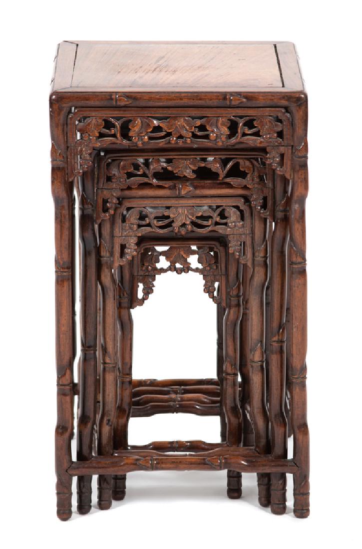 A Nest of Four Chinese Faux Bamboo Carved Hardwood: A Nest of Four Chinese Faux Bamboo Carved Hardwood Quartetto Tables 19TH CENTURY Height of largest 18 x 10 inches squared.