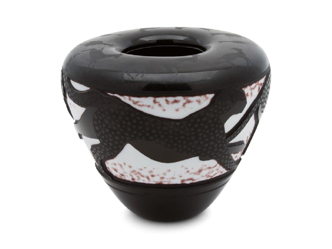 A Valerie Surjan Cameo Glass Cheetah Vase : A Valerie Surjan Cameo Glass Cheetah Vase 20TH CENTURY having etched decoration of deer on the shoulder, the sides with cheetahs; signed. Height 7 inches.