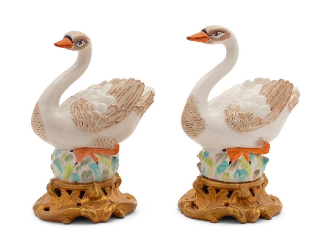 A Pair of Mottahedeh Ceramic Swans: A Pair of Mottahedeh Ceramic Swans20TH CENTURYHeight 8 1/4 inches.