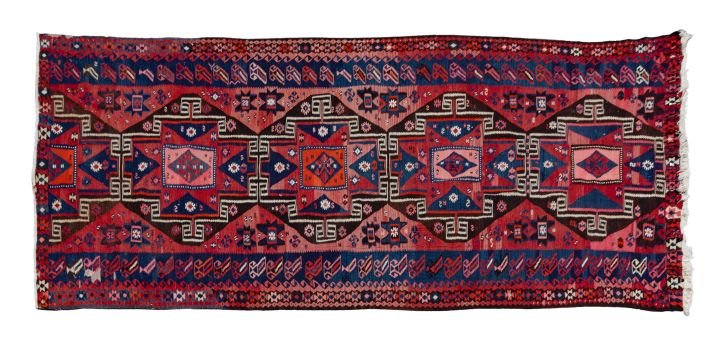 A Kilim Runner: A Kilim Runner 20TH CENTURY 12 feet x 5 feet 3 inches. Property from the Estate of Ian MacKaye Kean, 2 Via Mizner, Palm Beach, FL