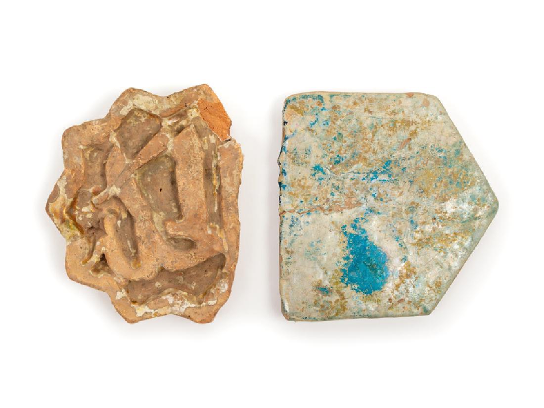 A Pair of Persian Islamic Tiles 12TH: A Pair of Persian Islamic Tiles 12TH CENTURY Height of largest 10 1/2 inches.