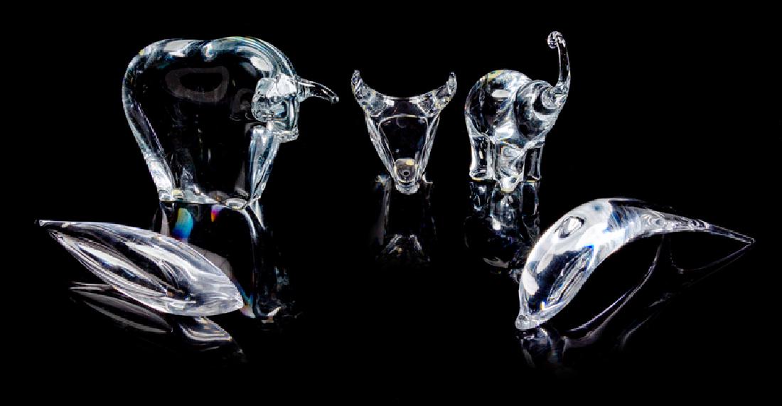 A Group of Glass Animal Figures Late 20th: A Group of Glass Animal Figures Late 20th Century comprising a Ronneby bull, a Daum bust of a bull, a Maleras elephant, a Kosta Boda dolphin and an unmarked example. Height of largest 6 1/4 inches.