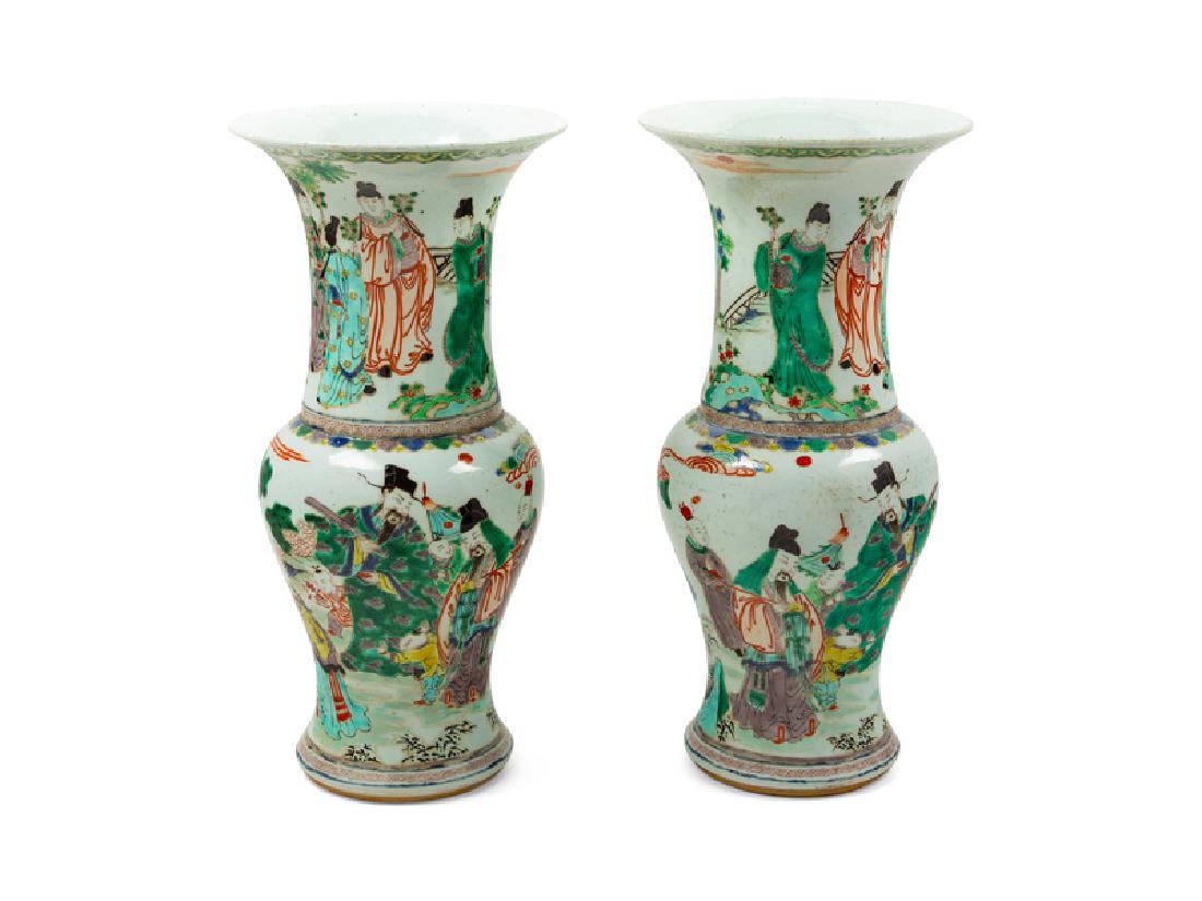 A Pair of Chinese Famille Verte Porcelain Yen-Yen Vases: A Pair of Chinese Famille Verte Porcelain Yen-Yen Vases 20TH CENTURY each has waisted body rising from a flared foot to a tall trumpet-shaped neck, painted with officials and their attendants in the g