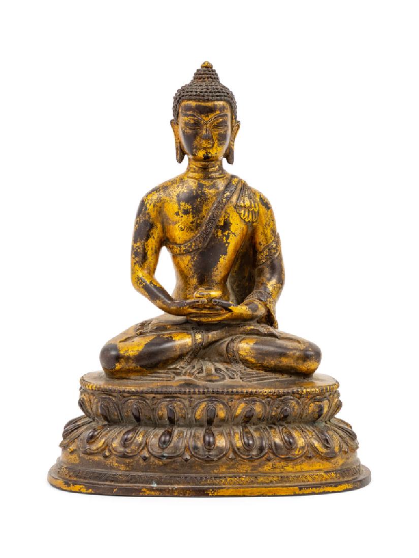 A Chinese Gilt Bronze Figure of Buddha 20TH CENTURY (1 of 2)