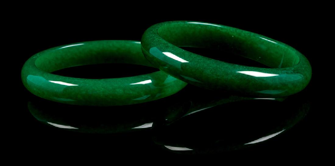 A Pair of Chinese Green Jade Bangles each of (1 of 1)