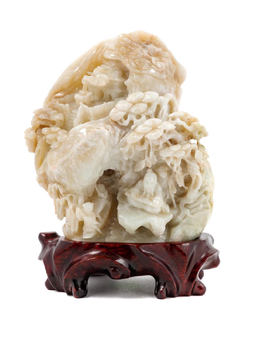 A Chinese Possibly Jade Carving carved in relief of (1 of 2)