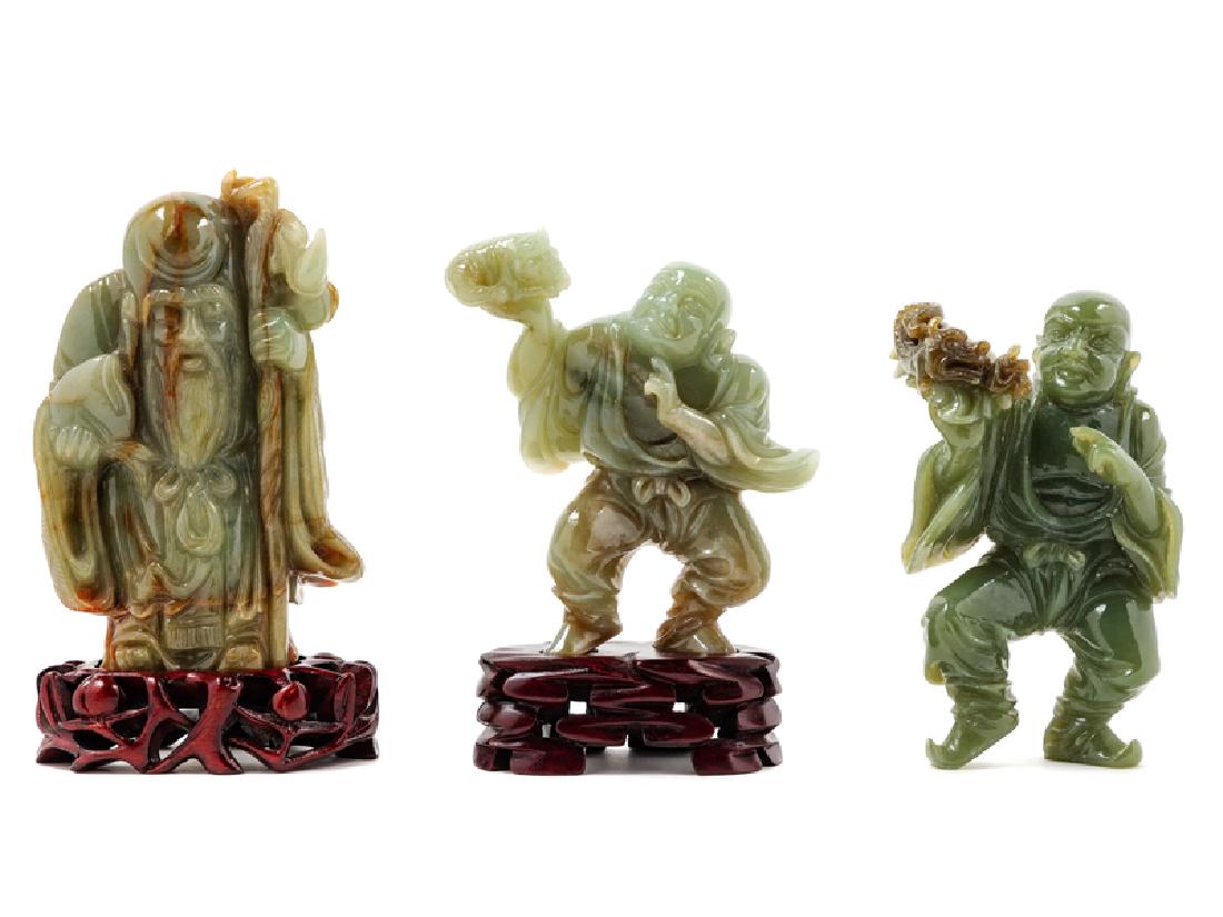 Three Chinese Celadon Jade Figures 20TH CENTURY showing (1 of 1)