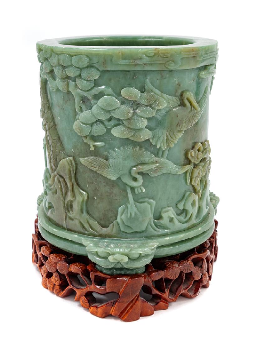 A Chinese Celadon Jade Cylindrical Brushpot raised on (1 of 1)