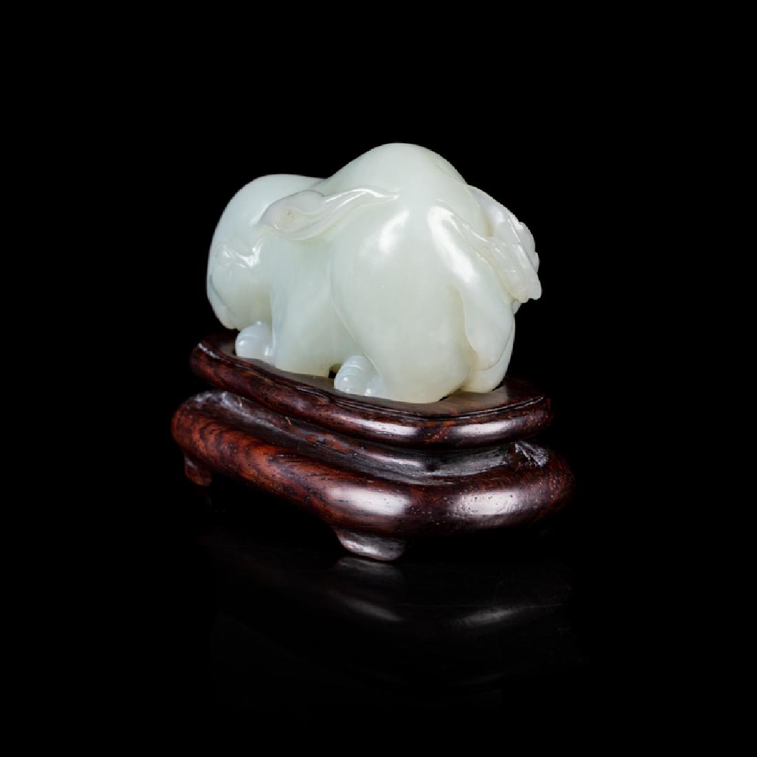 A Chinese Pale Celadon Jade Figure of a Rabbit 20TH (1 of 2)