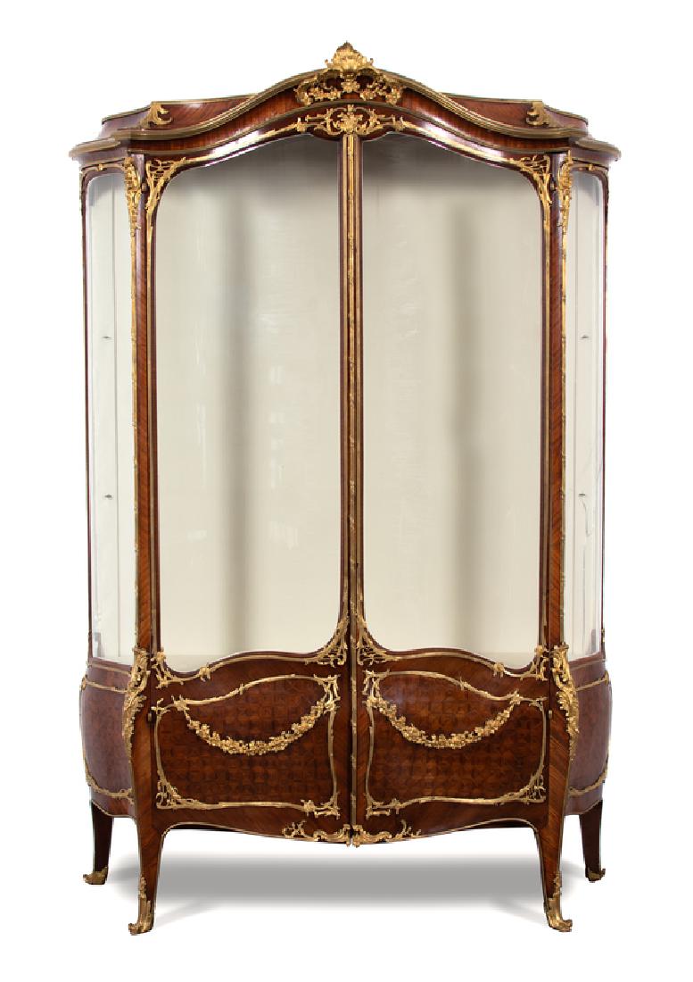 A Louis XV Style Gilt Bronze Mounted Parquetry Vitrine: A Louis XV Style Gilt Bronze Mounted Parquetry Vitrine Cabinet Manner of Joseph-Émmanuel Zwiener, Late 19th Century Height 90 x width 57 1/2 x depth 21 inches. Note: Buyer will be responsible for shi