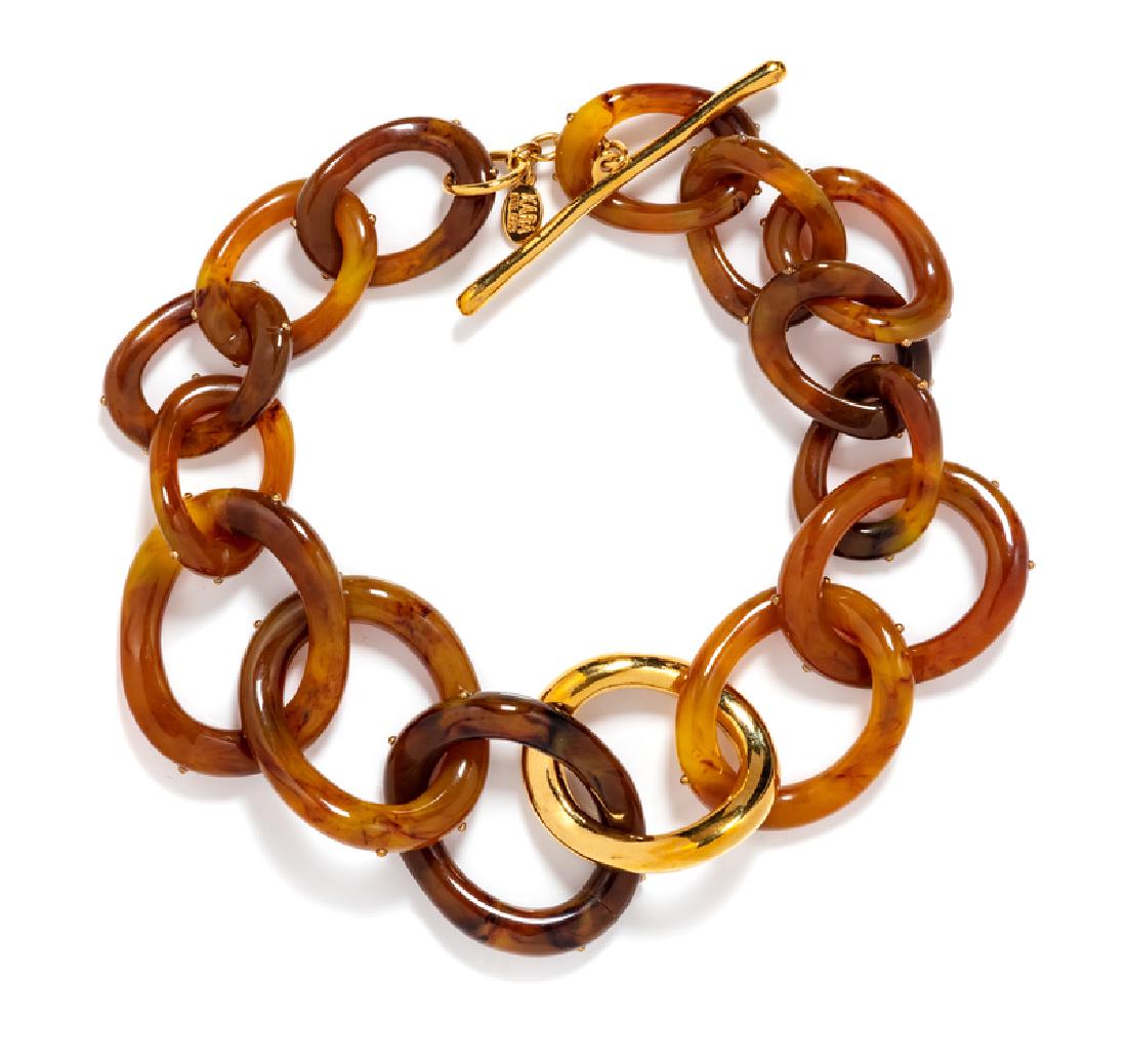 Kara Ross Necklace, 2012: Kara Ross Necklace, 2012 Tan lucite links with goldtone studs and a single goldtone link with a toggle clasp. Stamped: Kara Ross Length: 18" Condition: Overall very good condition. Very light wear. Th