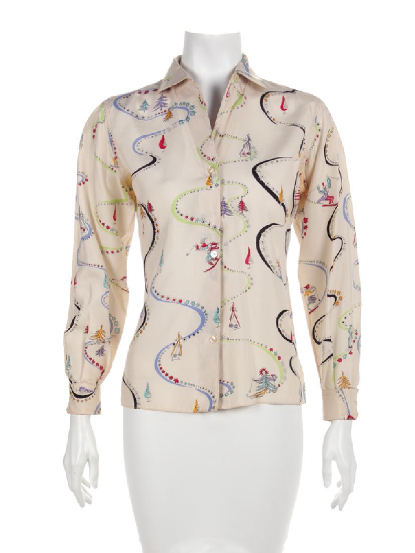 Pucci Shirt and Separate Pucci Slip, 1960-80s: Pucci Shirt and Separate Pucci Slip, 1960-80s White silk shirt printed with skiing scene of trees ad skiing figures with long sleeves and a center front button closure. Label: Emilio Pucci / Florenc