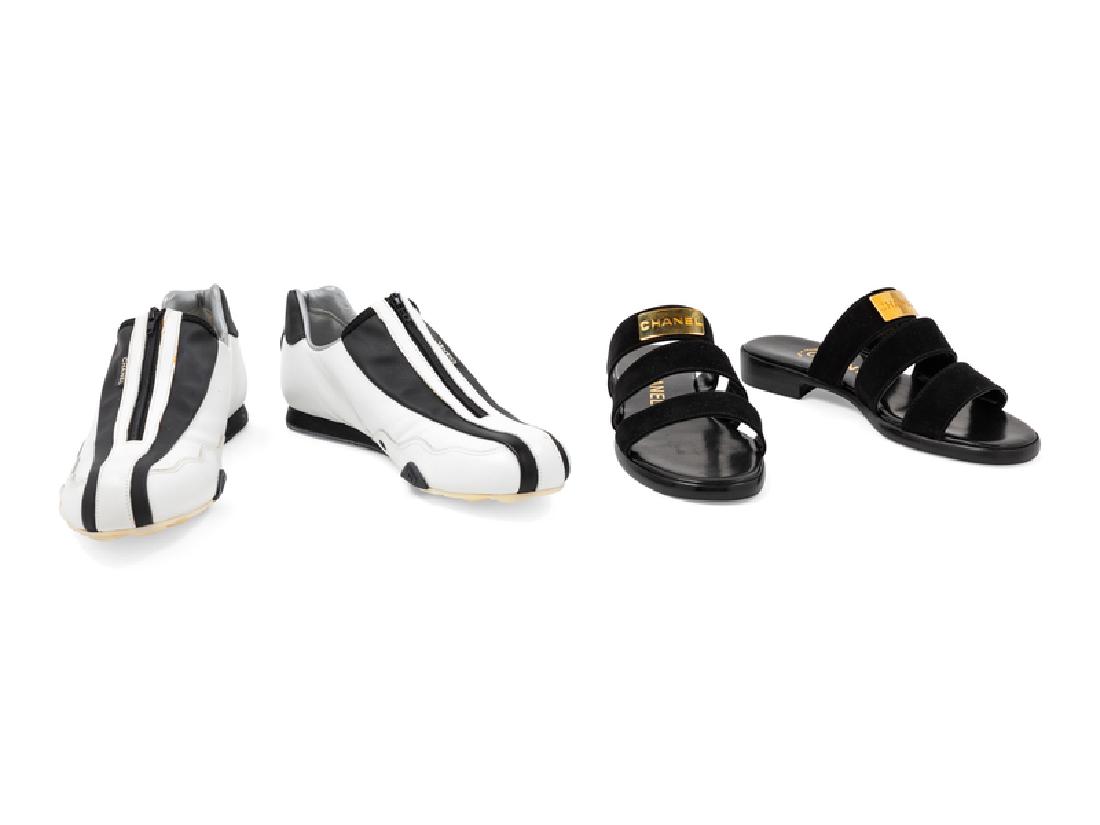 Two Pairs of Chanel Shoes, 1990-2000s: Two Pairs of Chanel Shoes, 1990-2000s The first: white leather sneakers with black CC logo. The second: black suede strappy mules with a goldtone Chanel plaque. Both pairs size: 36.5". Stamped: Chan