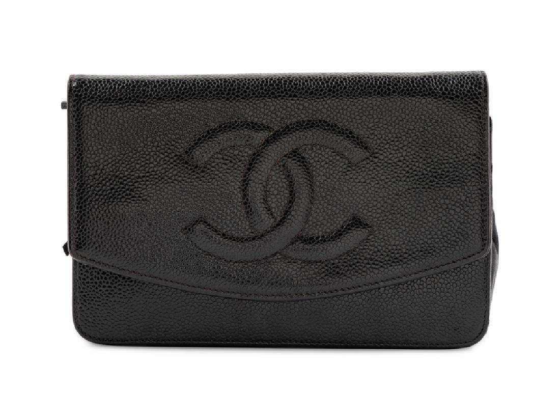 Chanel Wallet on Chain, 2002-2003: Chanel Wallet on Chain, 2002-2003 Black caviar leather with goldtone hardware, back exterior zip pocket, one front slip pocket and zip pocket, one interior compartment with slip pocket and card pocket