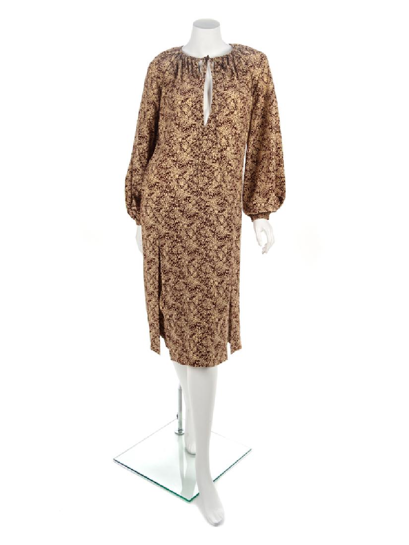 Galanos Dress, 1970s: Galanos Dress, 1970s Brown and cream printed dress with gathered elastic crew neckline that closes with a self-fabric tie, long full sleeves gathered into an elastic cuff and a double layered skirt wi