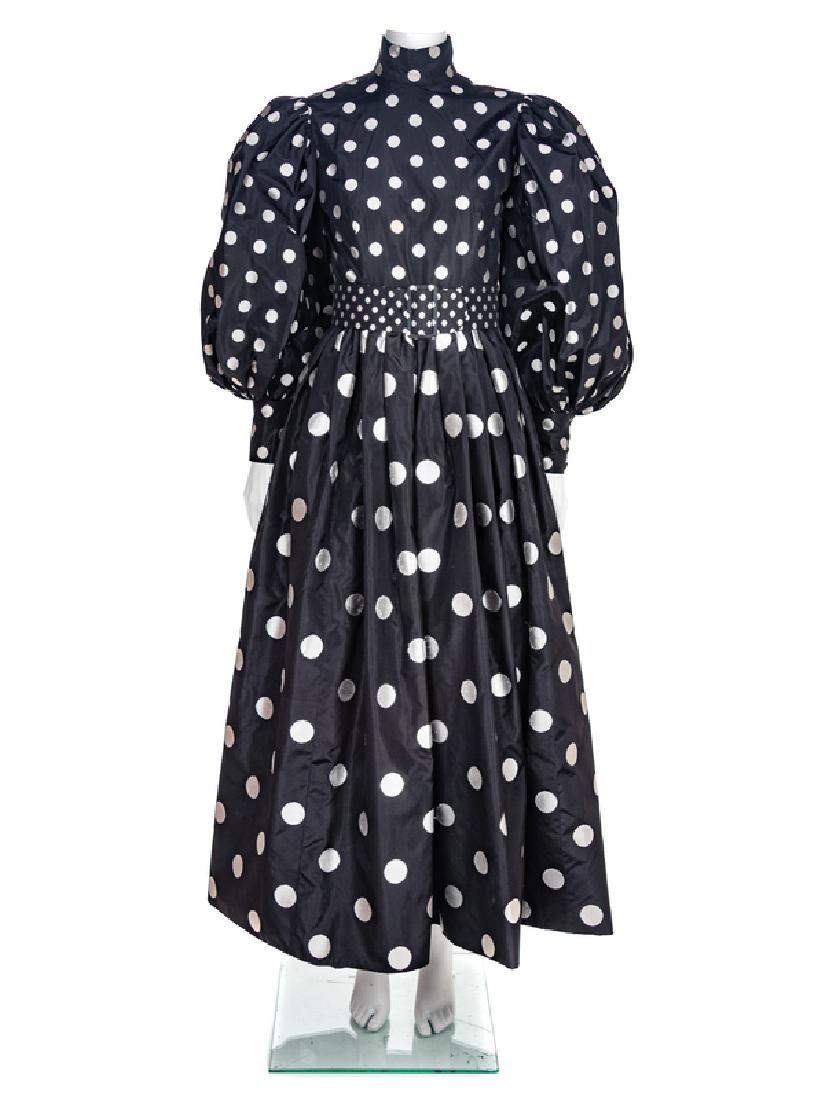 Norman Norell Evening Dress, 1960-70s: Norman Norell Evening Dress, 1960-70s Black silk taffeta woven with white polka dots with stand collar, long full sleeves gathered into a wide cuff and a very full skirt. Center back zipper and an att