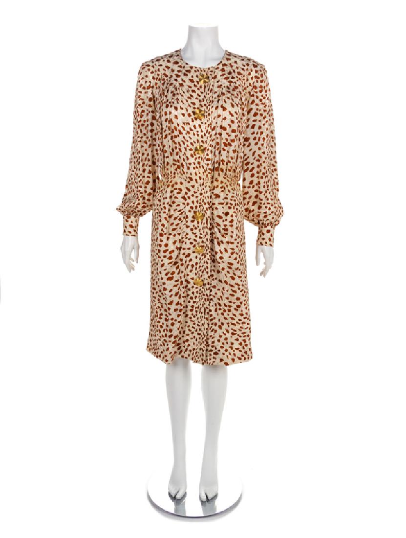 Givenchy Dress, 1980-90s: Givenchy Dress, 1980-90s Cream silk jacquard dress with a brown animal print. The dress is cut with a wide scoop neckline, long sleeves gathered into a buttoned cuff and a center front large goldtone 