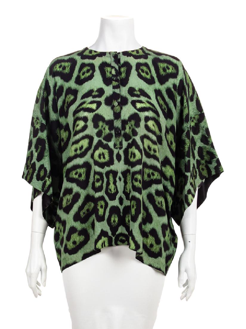 Givenchy Top, 1990-2000s: Givenchy Top, 1990-2000s A loose silk top printed with a green animal print and cut with a scoop neckline, short sleeves and a center front button placket. Unlined. Label: Givenchy / Paris Size Label: