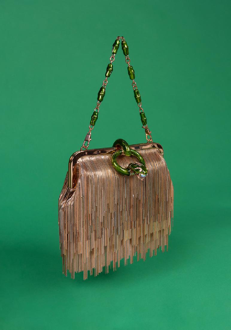 Gucci by Tom Ford Evening Bag, 2004: Gucci by Tom Ford Evening Bag, 2004 Champagne satin with rosegold tone frame, graduated chain fringe in goldtone, silvertone, and bronzetone metal, with a single removable green enamel bamboo link sho