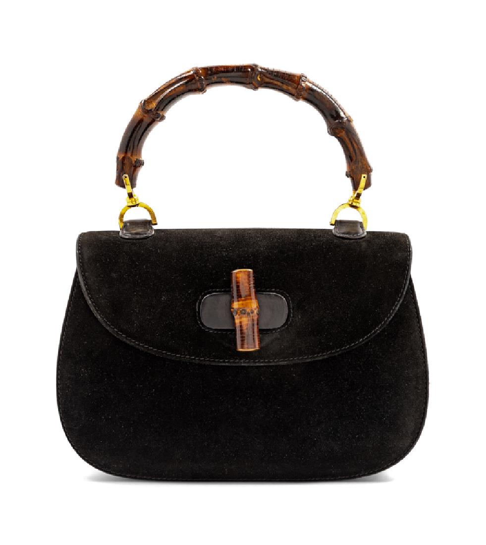 Gucci Vintage Bamboo Handbag, 1960s-80s: Gucci Vintage Bamboo Handbag, 1960s-80s Black suede with black leather gusset and base, goldtone hardware, black leather interior with two slip pockets and zip pocket with lift boy pull, front flap wi