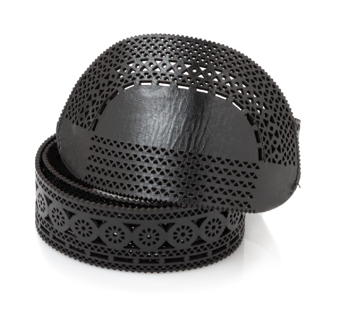 Dries Van Noten Black Leather Belt, 1980s: Dries Van Noten Black Leather Belt, 1980s Perforated black leather belt with a large buckle and hook closure. Stamp: Dries Van Noten / Real Leather / Made in Italy / 90 Condition: Belt is in goo