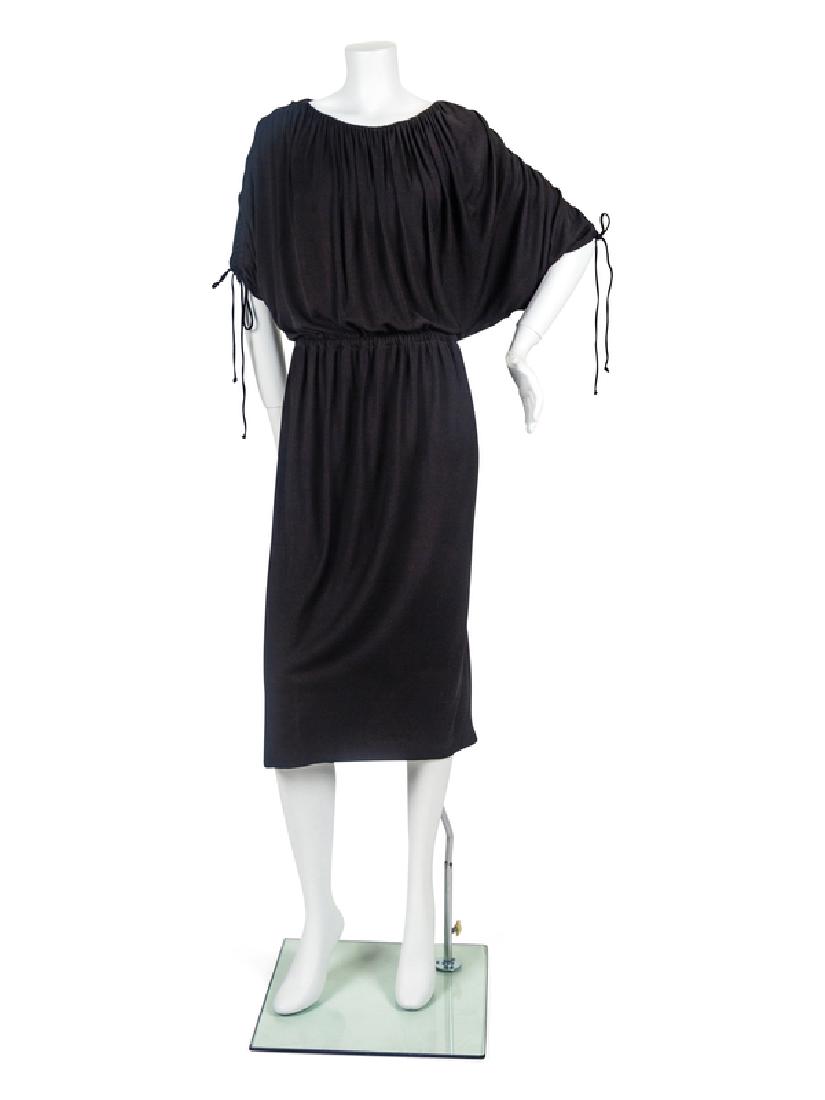 Halston Dress, 1970s: Halston Dress, 1970s Gathered black jersey dress inspired by Greco-Roman styles, with a gathered sleeve top and gathered waistline. The waistline further gathers with elastic. An inner tank-top in jer