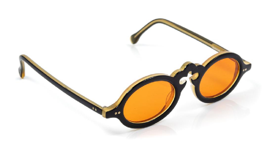 Jean Lafont Sunglasses, 1990-2000s: Jean Lafont Sunglasses, 1990-2000s Black and yellow frame with decorative trim at the center. Together a case. Stamped: Jean Lafont / Paris / Made in France Condition: Overall very good condition. Wea