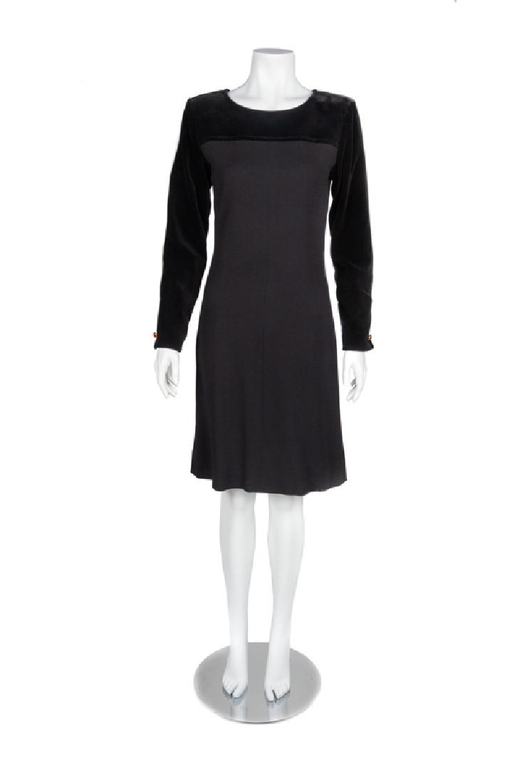 Yves Saint Lauent Dress, 1990s: Yves Saint Lauent Dress, 1990s Black wool dress with a crew neckline, velvet shoulder and long sleeves. The main part of the dress is made of black wool crepe and closes down the center back with an i
